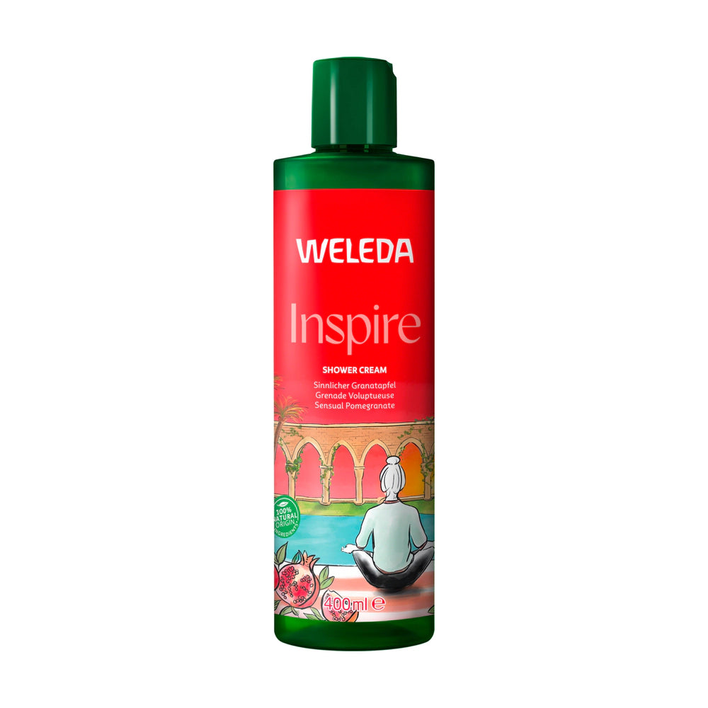 Weleda Inspire shower cream bottle on a white background