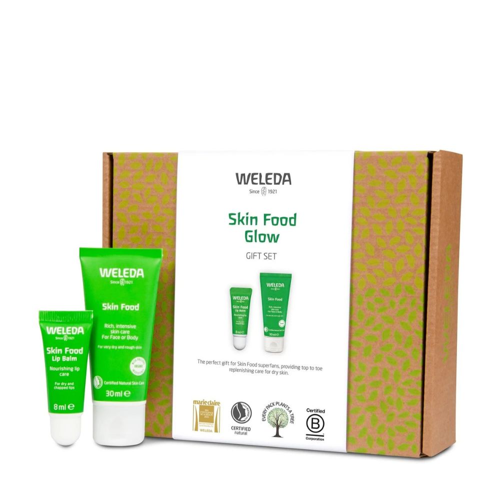Weleda Skin Food Glow gift set with green tubes and brown packaging on a white background