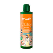 Weleda Vitality shower cream bottle on a white background
