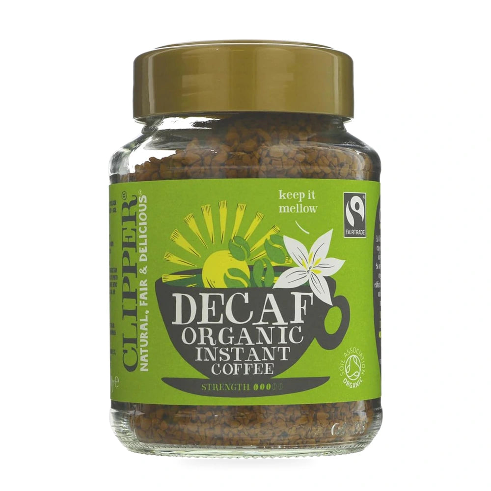 Jar of decaf organic instant coffee with a green label on a white background