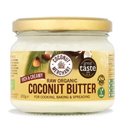 Jar of raw organic coconut butter with a gold lid on a white background