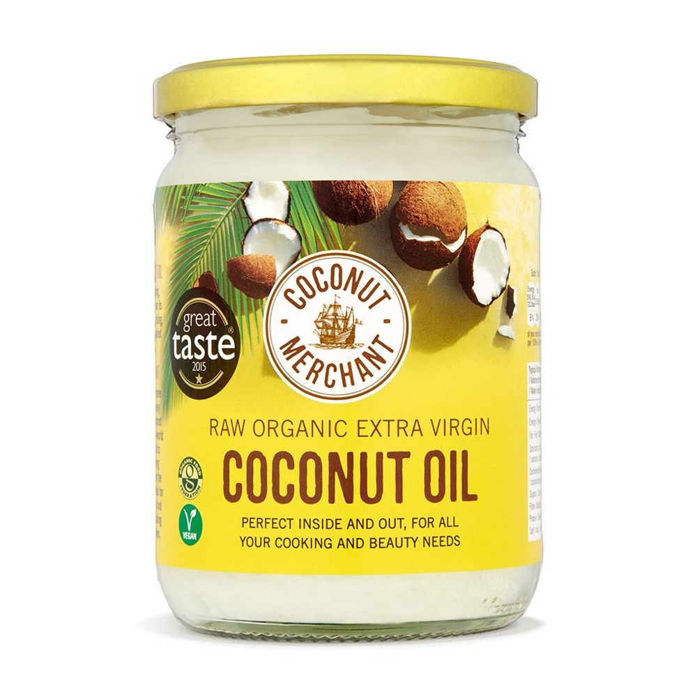 Jar of coconut oil with a yellow label featuring the Coconut Merchant branding.