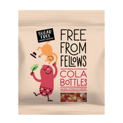 Packaging of Free From Fellows cola bottles with cartoon characters on a beige background