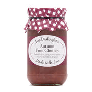 Jar of Mrs. Darlington's Autumn Fruit Chutney with a checkered lid on a white background