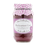 Jar of Mrs Darlington's Blackcurrant Curd with a checkered lid on a white background