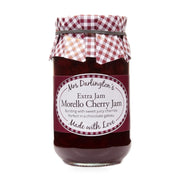 Jar of Mrs. Darlington's Morello Cherry Jam with a checkered lid on a white background