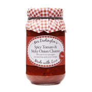Jar of Mrs. Darlington's Spicy Tomato & Sticky Onion Chutney with a checkered lid on a white background