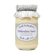 Jar of Sarah Darlington's Hollandaise Sauce with a checkered lid on a white background